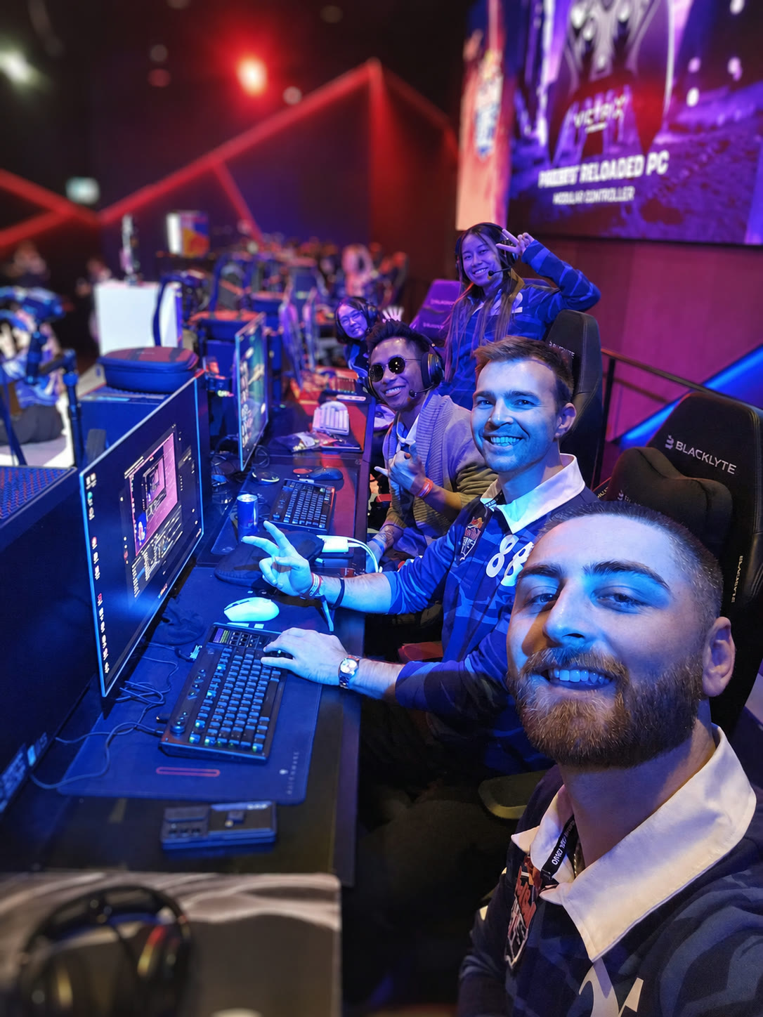 Seb working with fellow developers during a live PC build event.