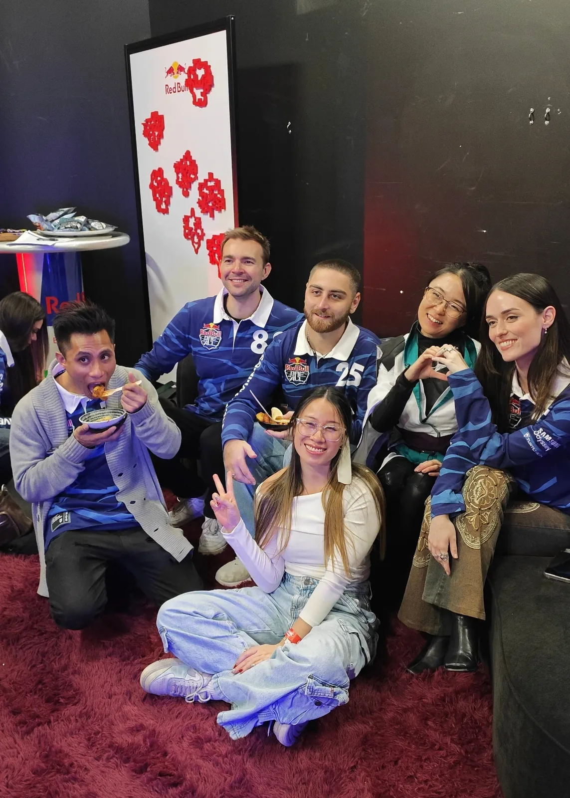 Seb and teammates gathered together at a social event.