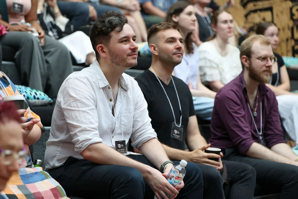 Seb seated in the audience at XR Hub.